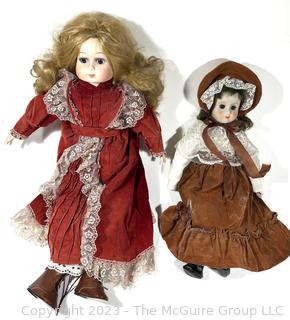 Two (2) Vintage Dolls with Porcelain Heads and Cloth Bodies. 