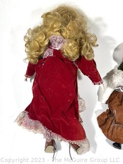 Two (2) Vintage Dolls with Porcelain Heads and Cloth Bodies. 