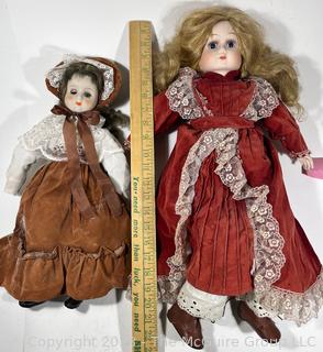 Two (2) Vintage Dolls with Porcelain Heads and Cloth Bodies. 