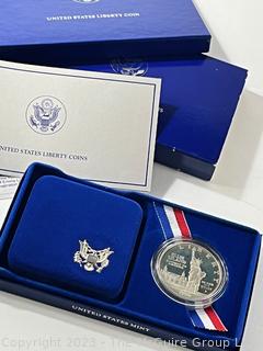 1986 United States Liberty Silver Dollar/Half Dollar Coin Set; and 1986 United States Liberty Silver Dollar Coin 