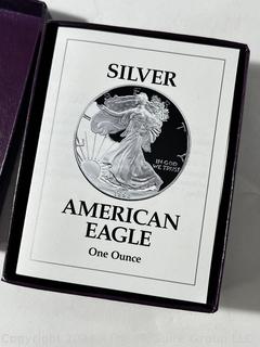 Three 1 OZ 99.9% silver "American Eagle" proof coins in presentation boxes (1993)