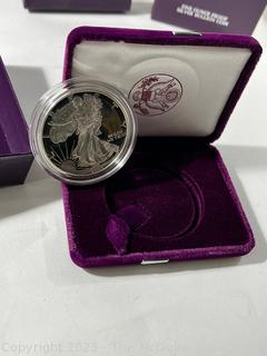 Three 1 OZ 99.9% silver "American Eagle" proof coins in presentation boxes (1993)