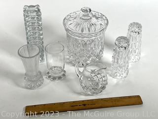 Seven (7) Pieces of Clear Crystal Decorative Items.