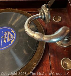 Victrola Commonwealth Trademark Phonograph in Mahogany Record Cabinet with Collection of 78 records and Edison Record.  17"w x 21"d x 41"t 