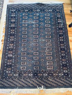 Pakistani Bokhara Hand Woven Rug on Blue Ground. Some wear spots. 49" x 74"