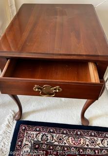 Cherry End Table with Single Drawer and Cabriolet Legs. 20" x 24"d x 23"t