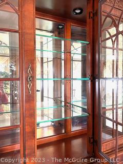 Chippendale Style China Display Lighted Hutch Cabinet with Mirrored Back and Glass Shelves.  Separates into two pieces. 17" deep, 71" wide, 86" tall (36" for base only)