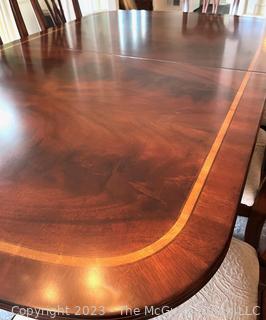 Mahogany Inlaid Dining Table with Eight (8) Dining Chairs (Two with Arms). With additional leaf.  Table 72"l x 46"w x 29" t. Chair 43"t x 25"w   Additional leaf 18" wide.