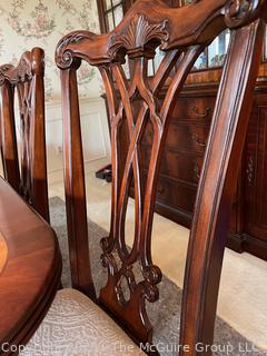 Mahogany Inlaid Dining Table with Eight (8) Dining Chairs (Two with Arms). With additional leaf.  Table 72"l x 46"w x 29" t. Chair 43"t x 25"w   Additional leaf 18" wide.