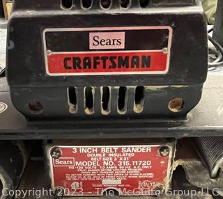 Selection of corded electric hand tools: Vintage Sears Craftsman 315-17480 Router Model 315-17480; drill; saber saw; belt sander