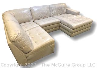 Silver Gray Leather Sectional Sofa. 112"w x one arm 72", other 62" x  38" deep.  Four pieces. 
 