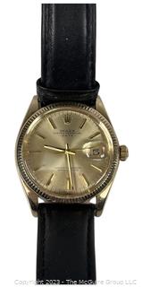 Circa 1970 ROLEX Oyster Perpetual Date - 26 Jewels, 5 positions Montres Movement.   Working. 1 Owner. Back was removed by technician to show authenticity of movement.  Case is stamped 14k. See all photos in the photo gallery.  Payment by certified funds only for this Lot.  