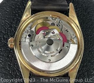 Circa 1970 ROLEX Oyster Perpetual Date - 26 Jewels, 5 positions Montres Movement.   Working. 1 Owner. Back was removed by technician to show authenticity of movement.  Case is stamped 14k. See all photos in the photo gallery.  Payment by certified funds only for this Lot.  