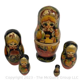 Russian Enamel Matryoshka Nesting Dolls and Russian Khokhloma Lacquer Berry Bowl.