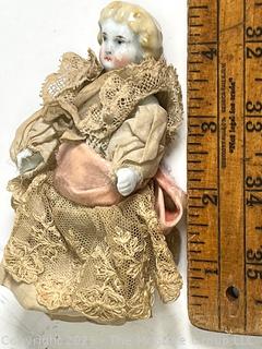 Small Victorian Porcelain China Doll with Hand Made Lace Dress. 4" tall