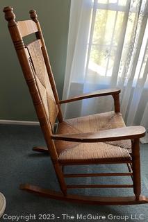 Primitive Turned Oak Rocking Chair with Rush Seat and Back.  27"w x 21"d x 43"t