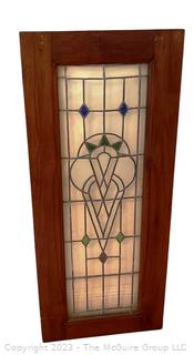 Arts & Crafts Leaded Glass Panel in Dark Wood Frame.  Second of two being offered in this auction.  20" x 46". See Images In Photo Gallery For Condition Issues  {NO SHIPPING}