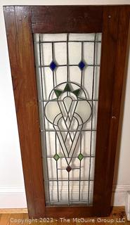 Arts & Crafts Leaded Glass Panel in Dark Wood Frame.  Second of two being offered in this auction.  20" x 46". See Images In Photo Gallery For Condition Issues  {NO SHIPPING}