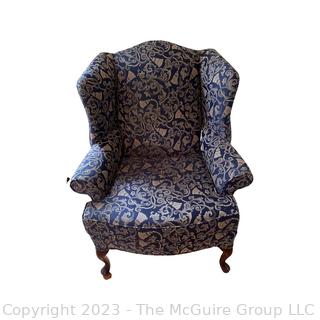 Blue and Gold Upholstered Wing Back Arm Chair. 