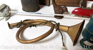 Group Including Brass Horn and Cast Iron Birds 