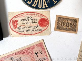 Group of Ephemera Including Travel Stickers and Paper Money