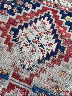 Hand Woven  Wool Persian Area Rug Blue on Red Ground. Condition issues. 39" x 47"