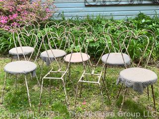 Set of Eight (8) Metal Chairs with Heart Shaped Back.