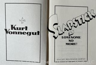 Books: "Slapstick" by Kurt Vonnegut and "Little Women" by Alcott