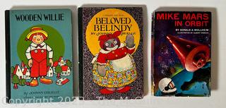 Three (3) Childrens Books Including Wooden Willie, Raggedy Ann and Mike Mars. 