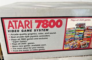 Atari 7800 ProSystem Game Console with Controllers and Games. 