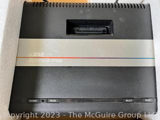 Atari 7800 ProSystem Game Console with Controllers and Games. 