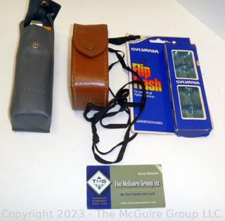 Vintage camera equipment: TOPCON Flash attachment, Flash bar, and GE light meter