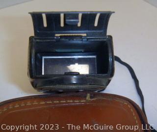 Vintage camera equipment: TOPCON Flash attachment, Flash bar, and GE light meter