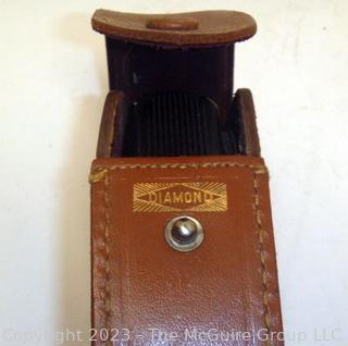 Vintage camera equipment: TOPCON Flash attachment, Flash bar, and GE light meter