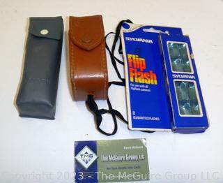 Vintage camera equipment: TOPCON Flash attachment, Flash bar, and GE light meter