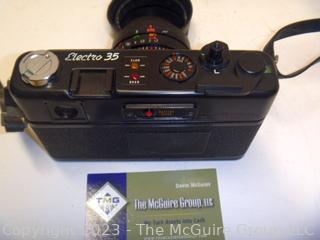 Vintage Yashica Electro 35 , film camera. 45mm lens, Untested but mechanics (shutter) appear to work. Cannot access battery portal