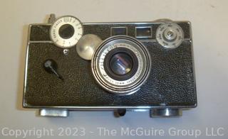 Selection of TWO (2) ARGUS C3 35mm film cameras; one leather camera case; both clean and mechanically working