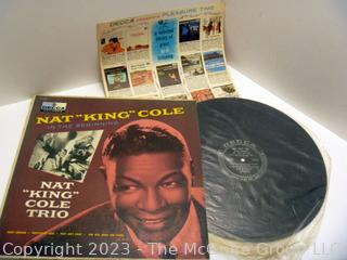 Selection of two (2) vinyl records: Nat King Cole and Ray Charles