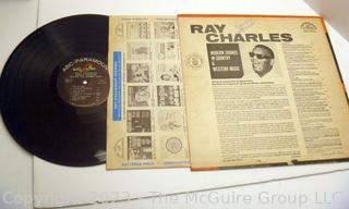 Selection of two (2) vinyl records: Nat King Cole and Ray Charles