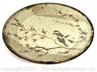 Hand Painted Stoneware Pottery Plate with Bird in Tree Signed By Artist Walsh.  11" diameter.