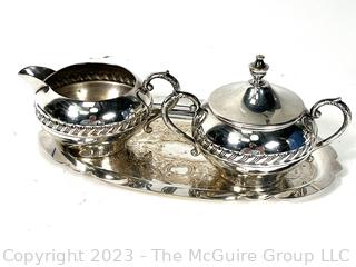 Silver Plated Serving Items Including Cream and Sugar Set.