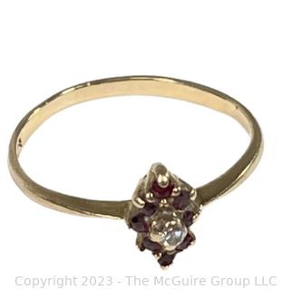 10kt Yellow Gold Narrow Band Ring with Ruby and Diamond Center. 