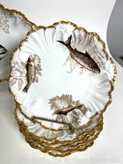 Antique Tressemann & Vogt Limoges Hand Painted Porcelain Fish Set with 12 Plates and a Platter.  One handle of platter has been damaged.  