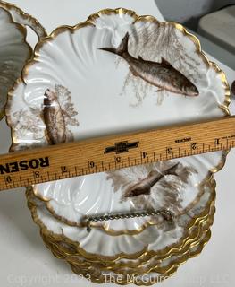 Antique Tressemann & Vogt Limoges Hand Painted Porcelain Fish Set with 12 Plates and a Platter.  One handle of platter has been damaged.  