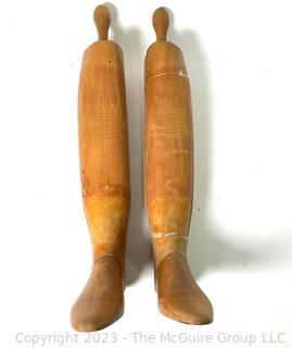 Two (2) Antique Equestrian Wood Boot Keeps or Forms. This pair of boot stretchers from the late 1800's separate into three sections that are dovetailed together with hinged toe and handle grip. 