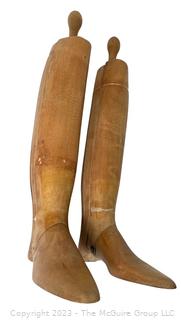 Two (2) Antique Equestrian Wood Boot Keeps or Forms. This pair of boot stretchers from the late 1800's separate into three sections that are dovetailed together with hinged toe and handle grip. 