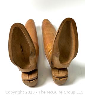 Two (2) Antique Equestrian Wood Boot Keeps or Forms. This pair of boot stretchers from the late 1800's separate into three sections that are dovetailed together with hinged toe and handle grip. 