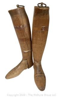 Two (2) Antique Equestrian Wood Boot Keeps or Forms from Maxwell 8 Dover St London. This pair of boot stretchers from the late 1800's separate into four sections that are dovetailed together with metal ring for hanging.  