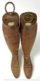 Two (2) Antique Equestrian Wood Boot Keeps or Forms from Maxwell 8 Dover St London. This pair of boot stretchers from the late 1800's separate into four sections that are dovetailed together with metal ring for hanging.  