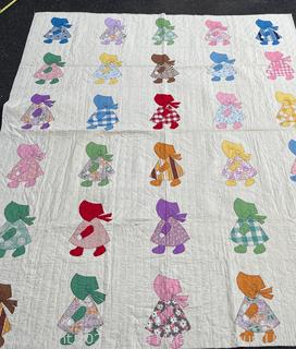 Hand Stitched Flour Sack Quilt in Sunbonnet Sue Pattern. 73" x 87"